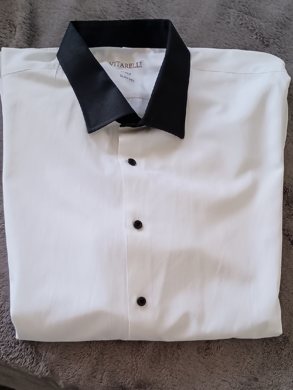 Vitarelli brand shirt is a white slim-fit dress shirt featuring